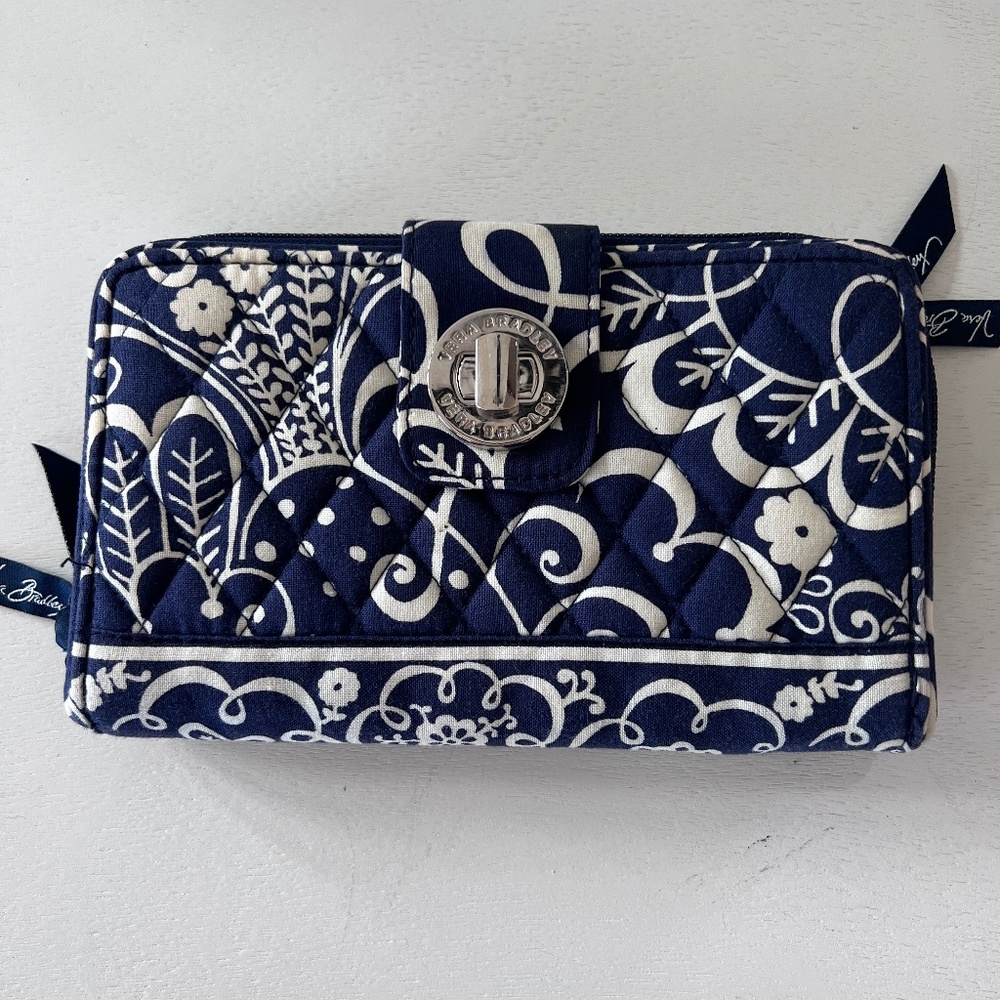 VERA BRADLEY Turn-lock Wallet in Navy Blue Twirly Birds Pattern